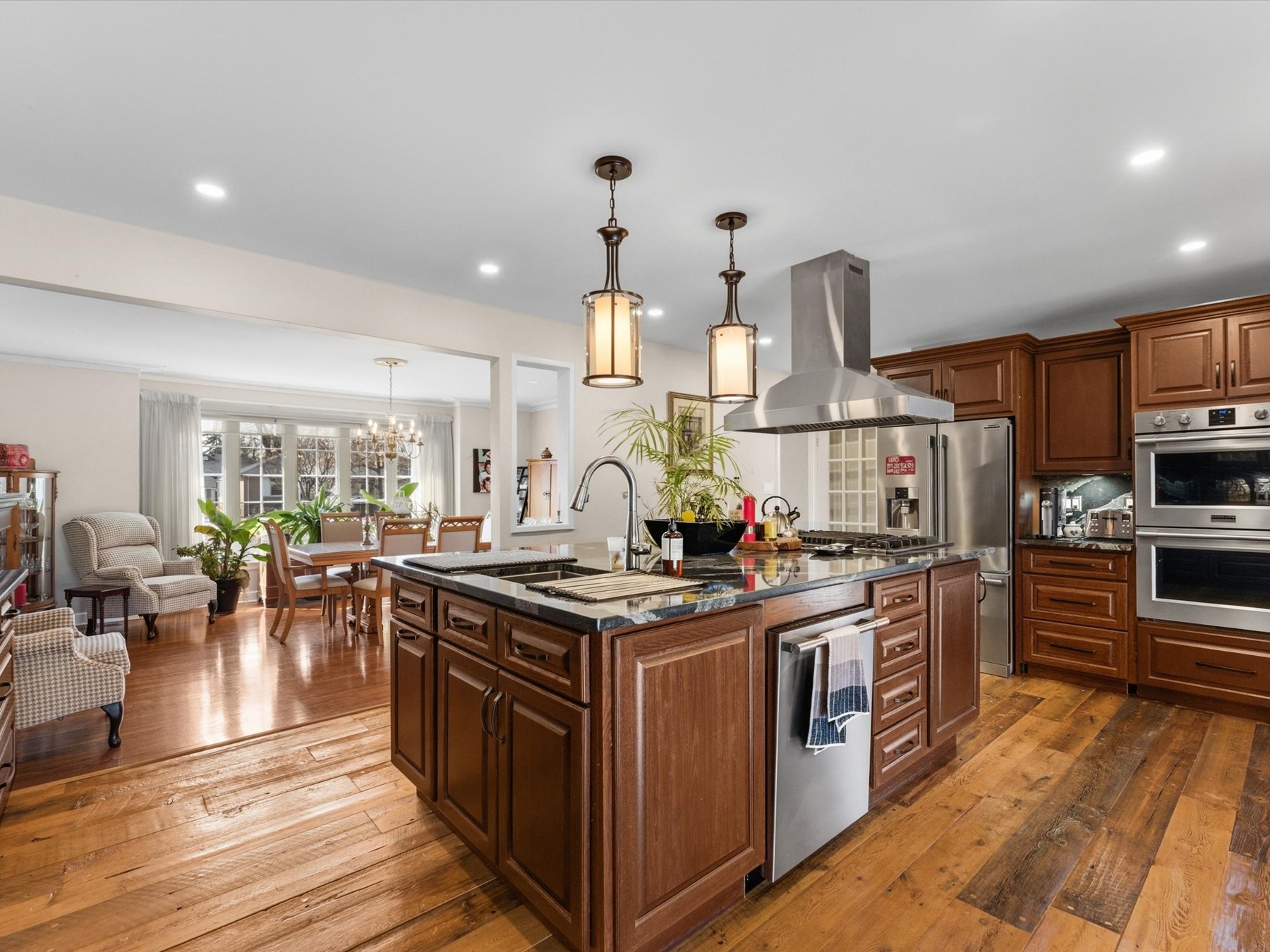 Kitchen with granite countertops and oversized island
