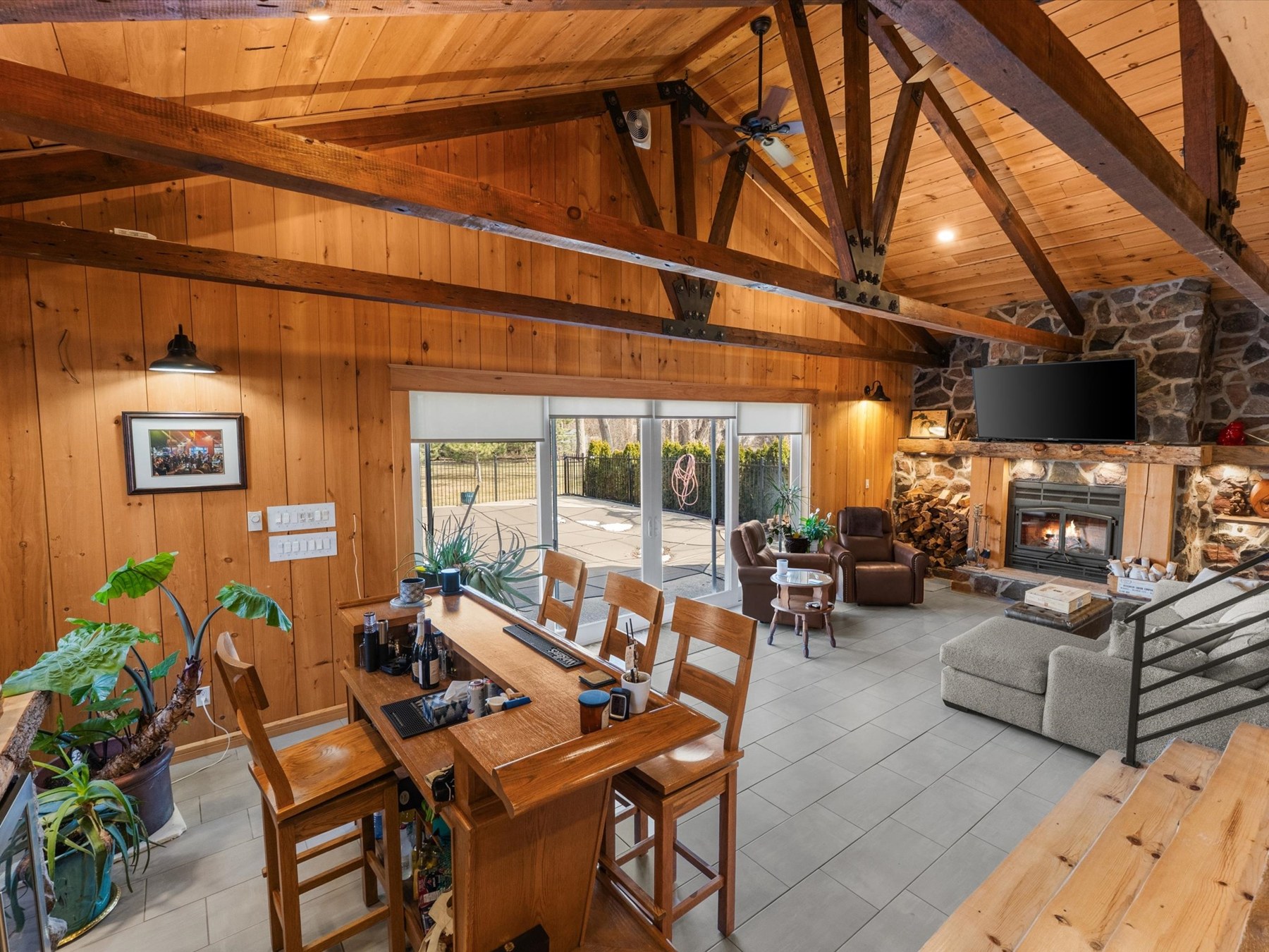 Rustic addition with natural wood beams