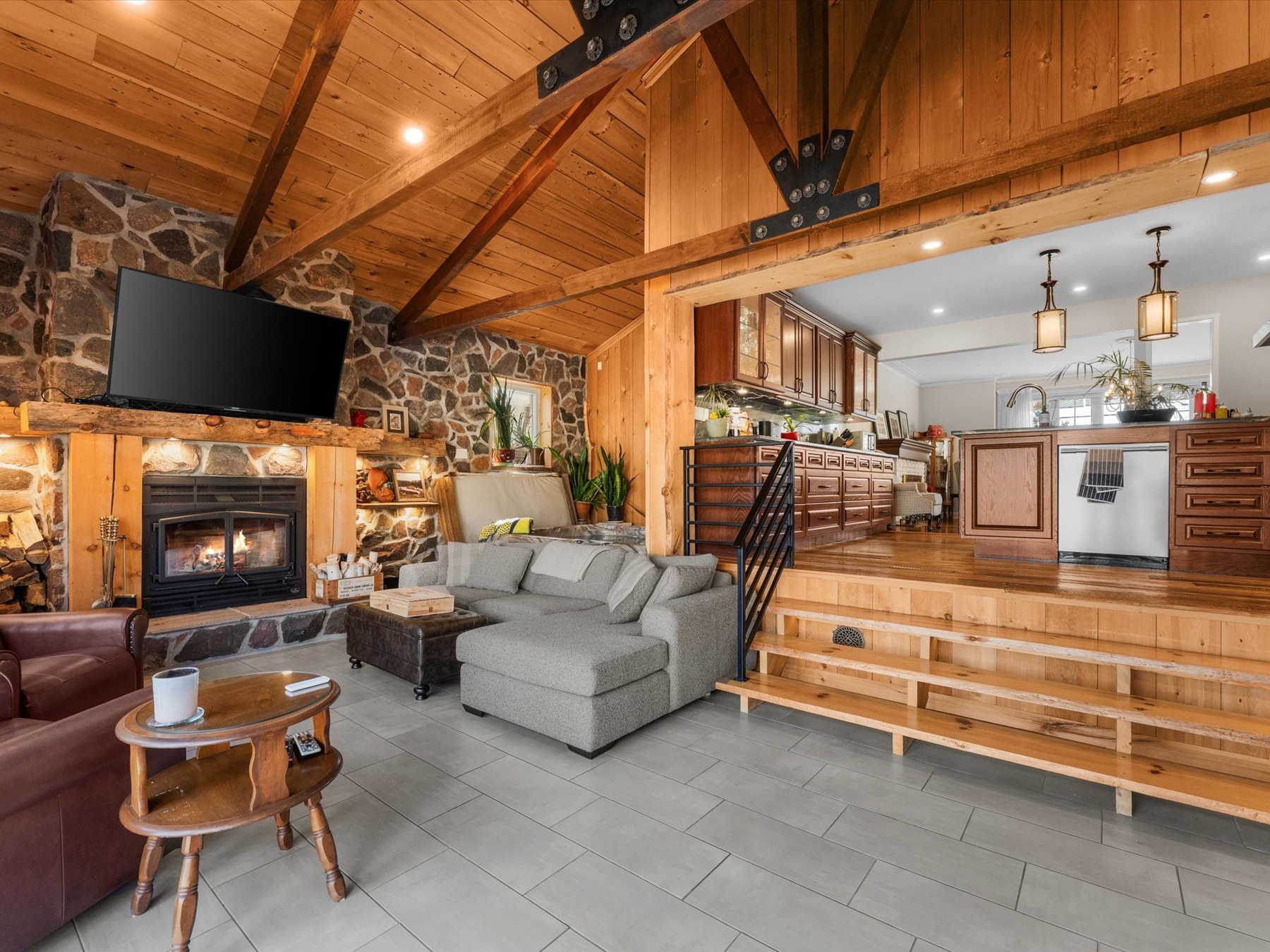 Living space with stone fireplace