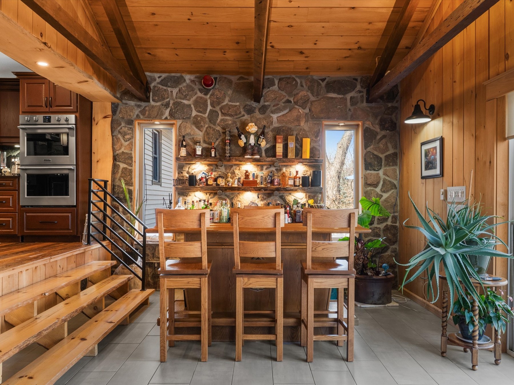Natural wood accents and stone detailing