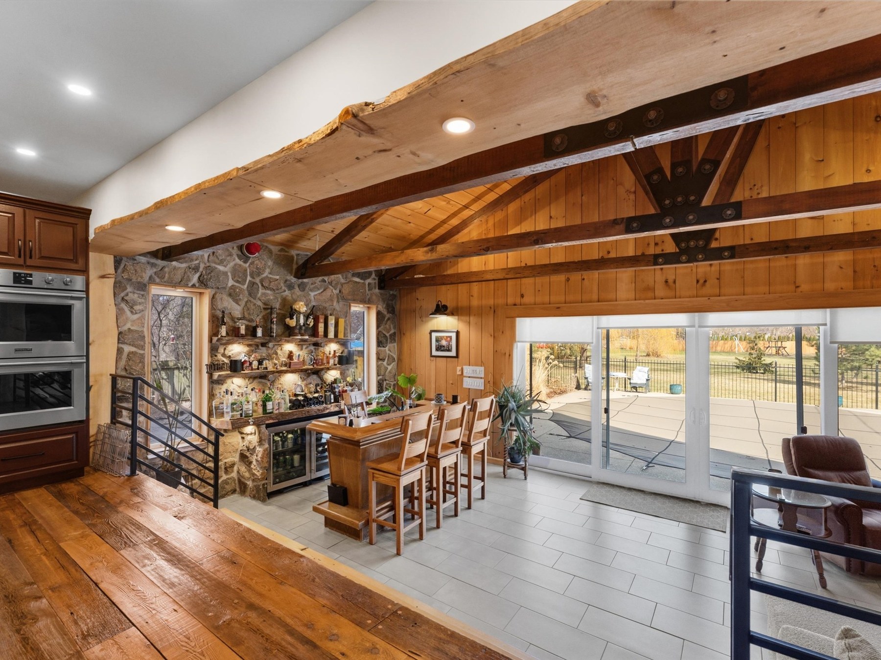 Addition with doors overlooking the backyard